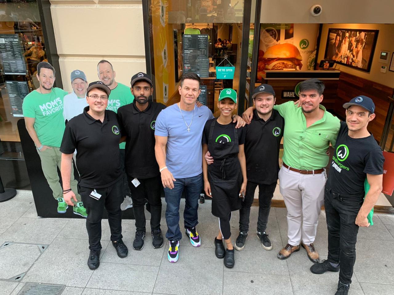David Martins with Mark Wahlberg and the restaurant team outside Wahlburgers London